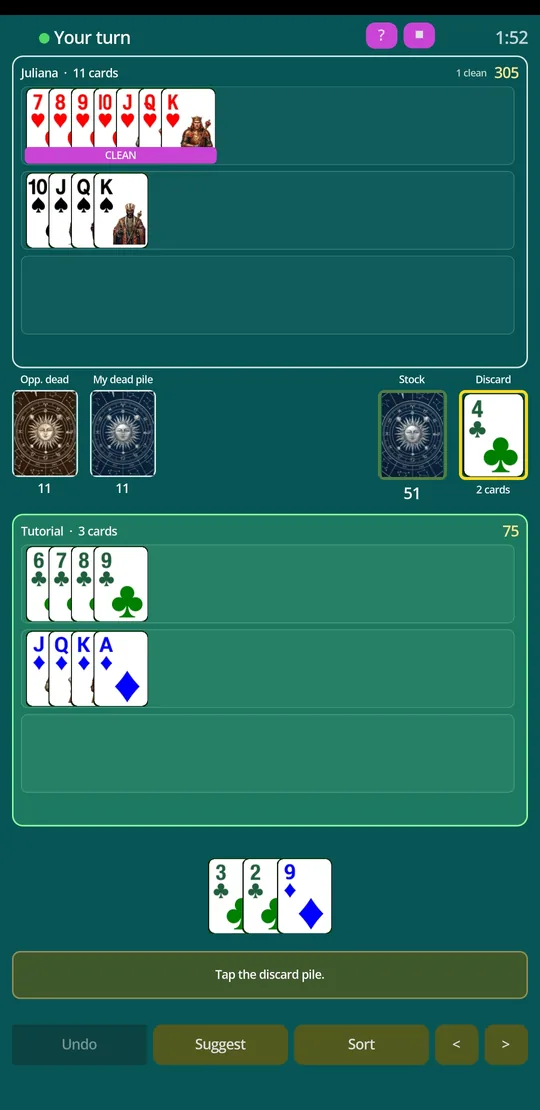 A table in play, with melds laid down, the stock and the discard pile